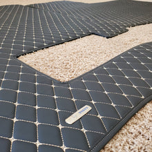 Load image into Gallery viewer, Volvo VNL 760 Diamond Stitch Leather Floor mats 4 Piece kit